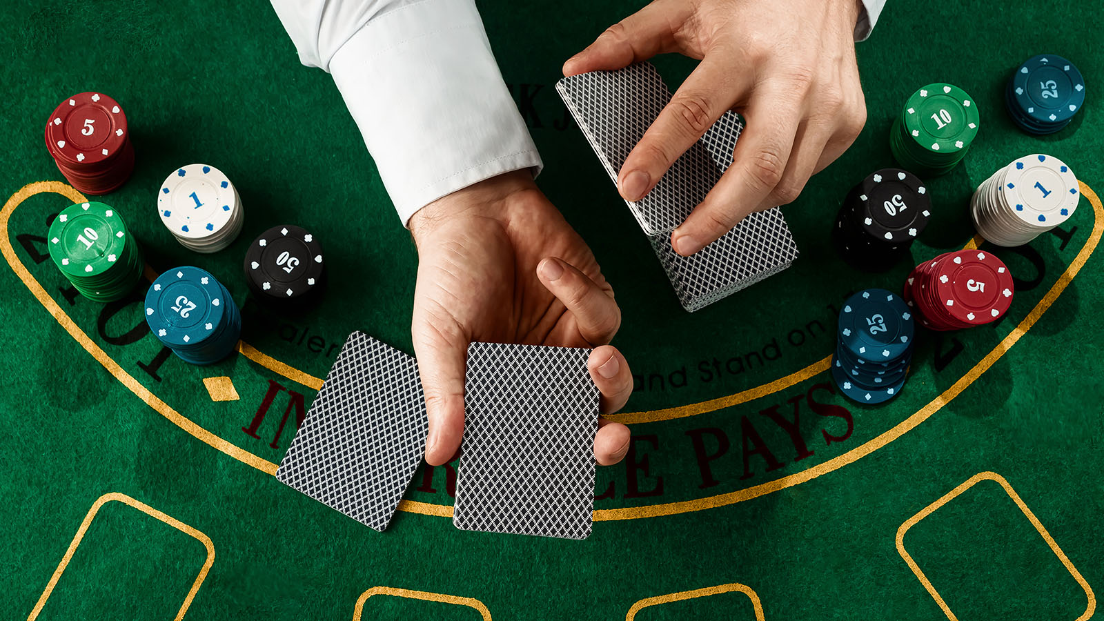 Blackjack table with dealer hand and chips